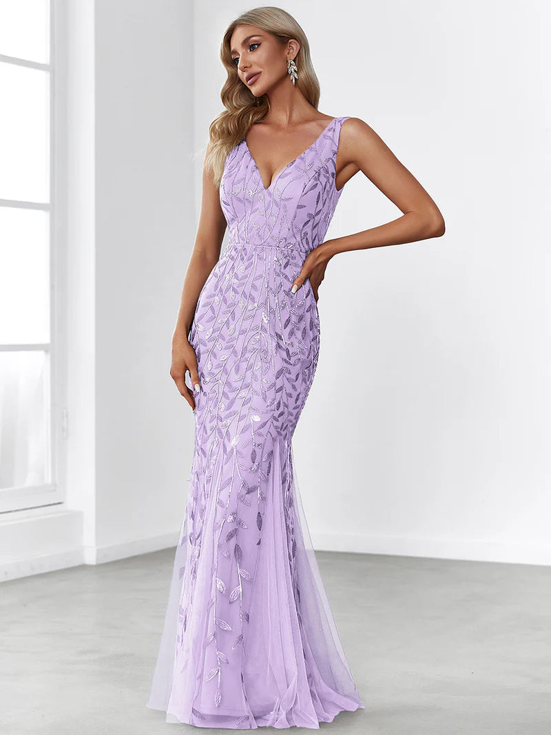 Lavender formal dress with fishtail and sequins.